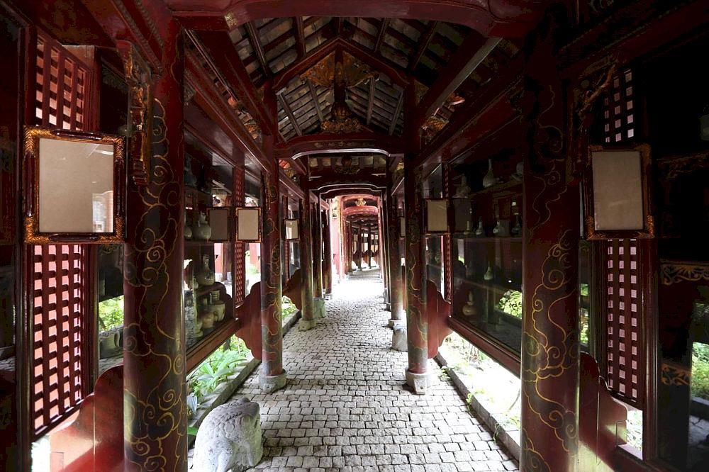 The entrance to the museum is designed in a distinctly Vietnamese style, featuring intricate and elaborate carvings